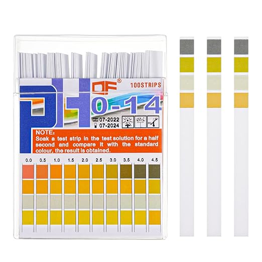 A pack of pH strips and three strips next to it